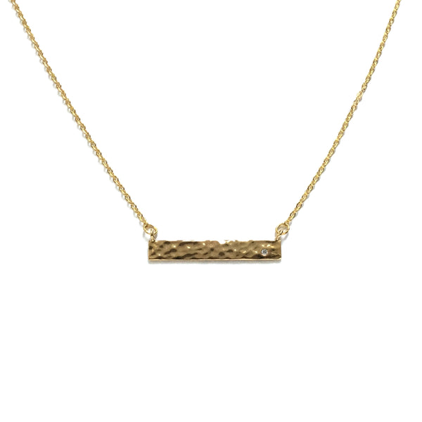 Gold plated hammered bar with a tiny cubic zirconia necklace