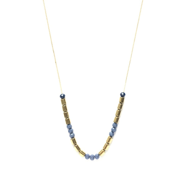 Golden brass tube bead spacers with tiny faceted electric blue glass beads on a thread chain necklace