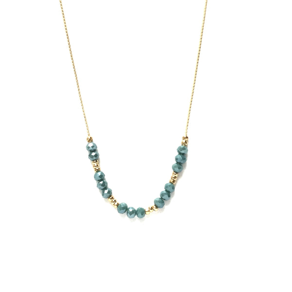 Faceted blue glass and tiny gold bead spacer necklace