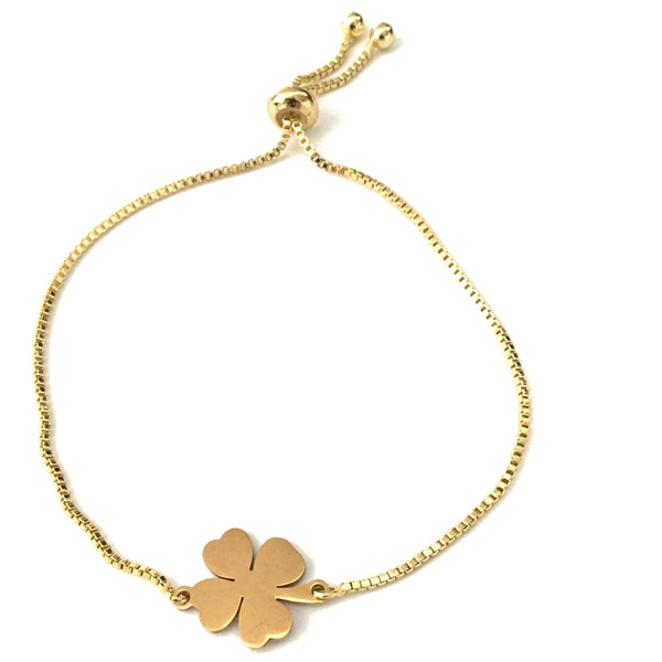 Gold stainless steel four leaf clover pendant on a gold stainless steel adjustable bracelet