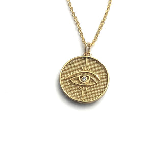 gold evil eye pendant