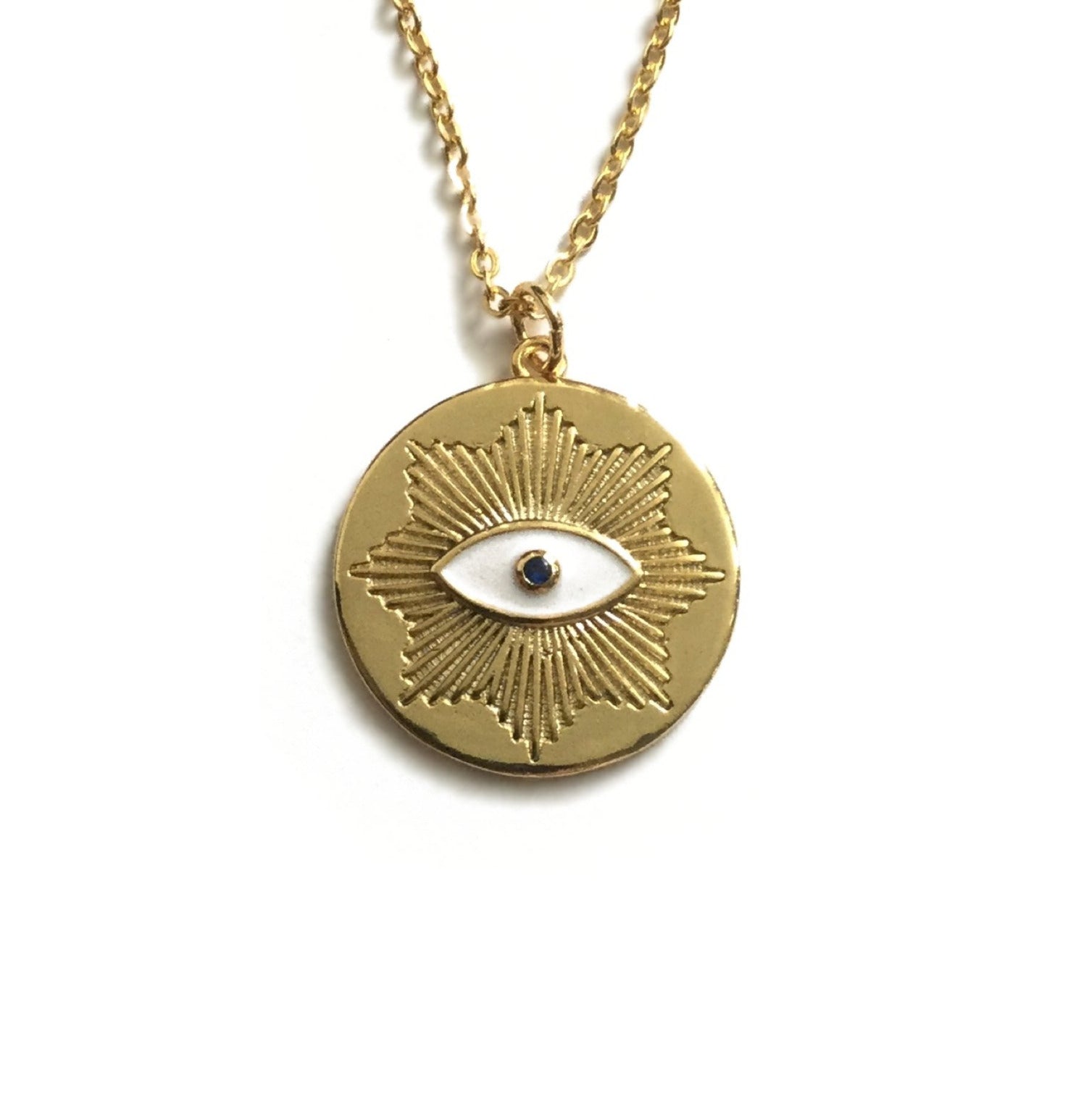 gold evil eye blue cubic zirconia medallion necklace
