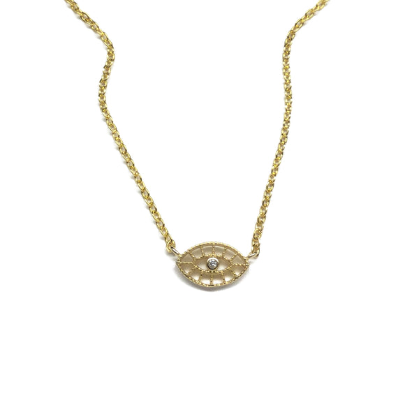 Gold evil eye shaped with a cubic zirconia stone in the centre and filigree design necklace