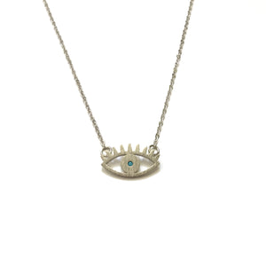 Silver plated matte evil eye shaped pendant with a tiny turquoise bead in the centre necklace