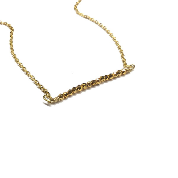 golden bead pyrite bar necklace