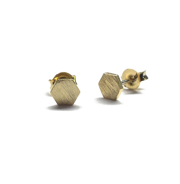 Tiny gold plated matte over brass hexagon stud earrings with sterling silver posts