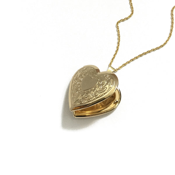 Gold plated heart locket with a floral heart design
