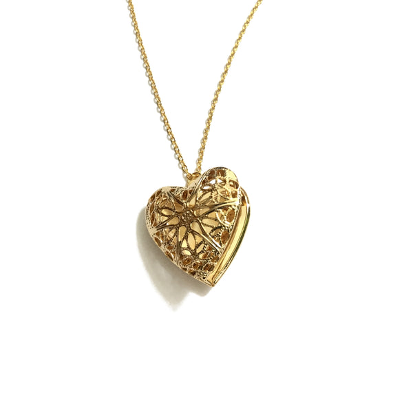delicate gold plated heart shaped filigree locket