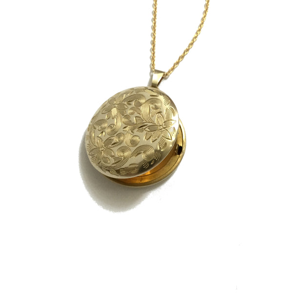 Gold plated shiny brass round floral locket